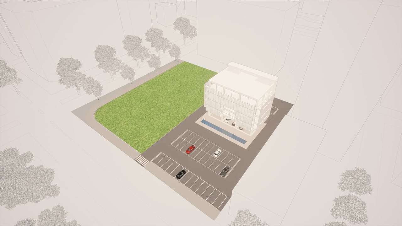 Aerial render of a pale block at the edge of a lawn with a long car park beside it