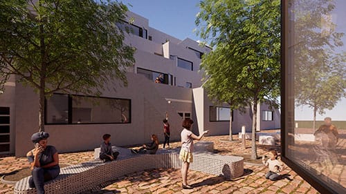 Neighbours and children gather around a long curved bench in the brick-paved court, under young trees, with the stepped front of the block rising behind