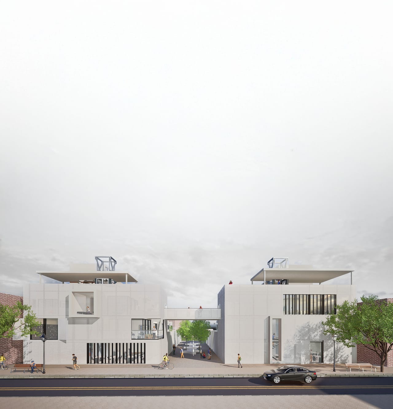 The same pale blocks in daylight, with rooftop pergolas, a footbridge over a narrow passage, brick neighbours either side and a car on the street